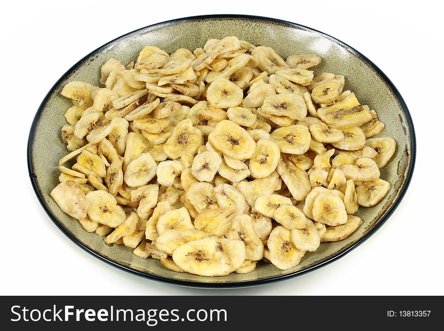 Dried banana slices on white background. Dried banana slices on white background