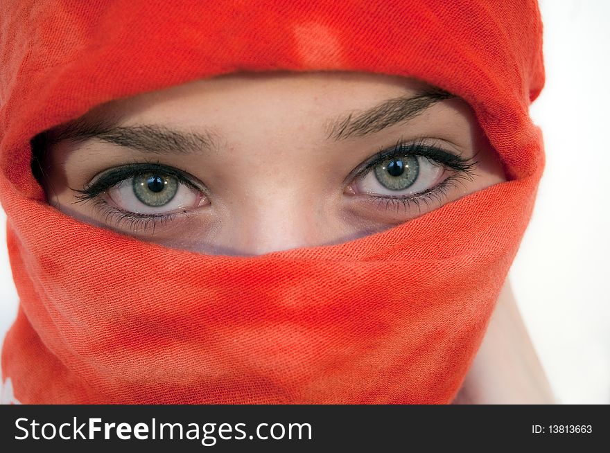 Beautiful Eyes of a Young Woman with red shawl