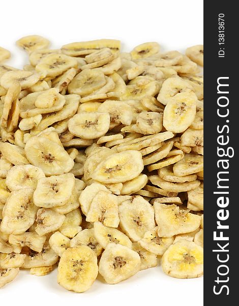 Dried banana slices on white background. Dried banana slices on white background