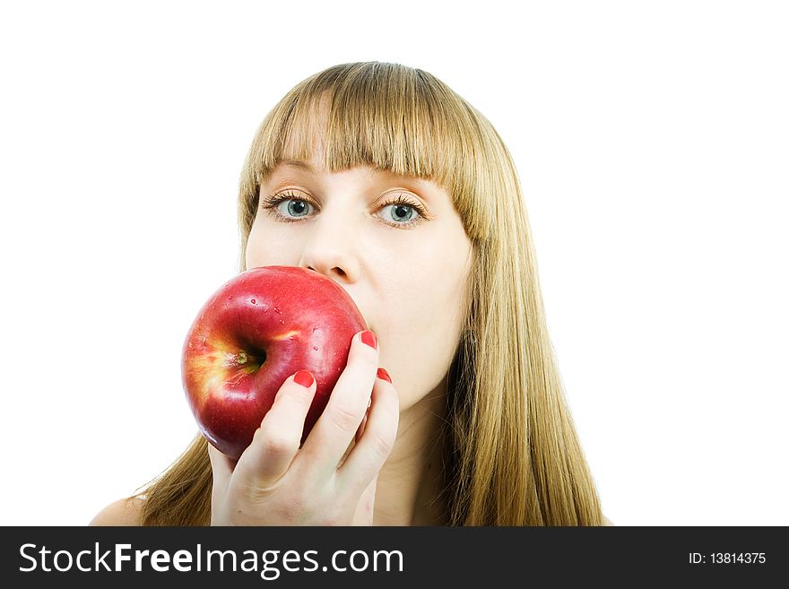 Young beautiful woman with a red apple on a white background