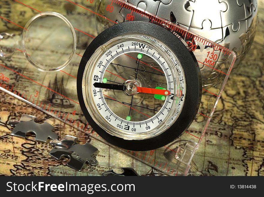 Compass on the old map