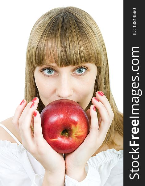 Young beautiful woman with a red apple on a white background