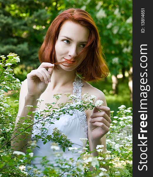 Portrait of a beautiful girl in blossoming garden. Portrait of a beautiful girl in blossoming garden
