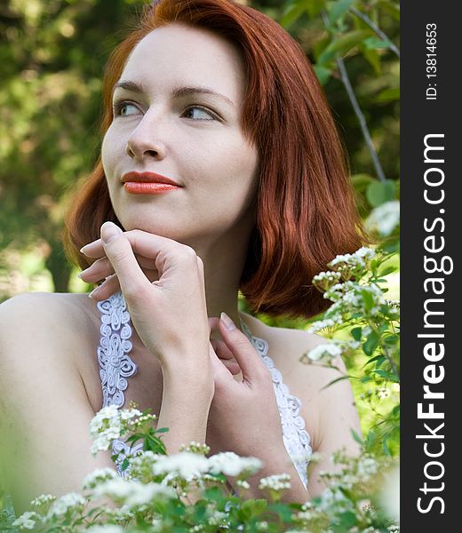 Portrait of a beautiful girl in blossoming garden. Portrait of a beautiful girl in blossoming garden