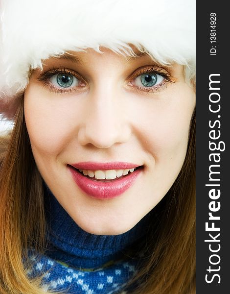 Portrait of a young beautiful woman in Santa hat. Portrait of a young beautiful woman in Santa hat