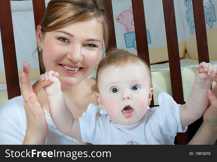 Young beautiful mother with litlle cute baby daughter. Young beautiful mother with litlle cute baby daughter