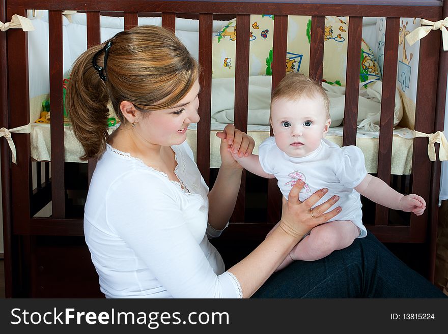 Young beautiful mother with litlle cute baby daughter. Young beautiful mother with litlle cute baby daughter