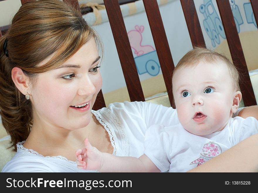 Young beautiful mother with litlle cute baby daughter. Young beautiful mother with litlle cute baby daughter