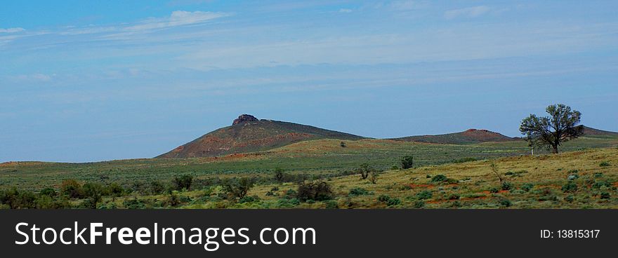 A peak from an old mountain range near the Barrier Highway, Outback South Australia. A peak from an old mountain range near the Barrier Highway, Outback South Australia.