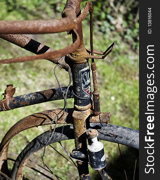 Old, rusty bike outside in the sun. Old, rusty bike outside in the sun