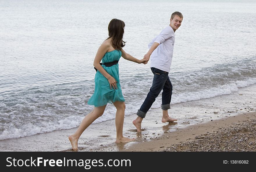 Couple enjoying themselves on the beach