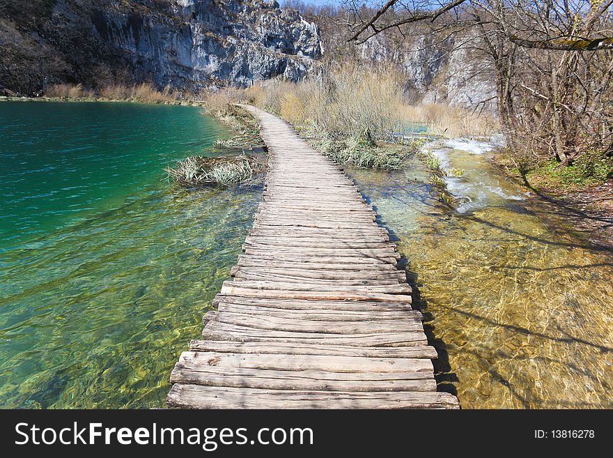 Wooden pathway through the falls at plitvice lakes in croatia. Wooden pathway through the falls at plitvice lakes in croatia