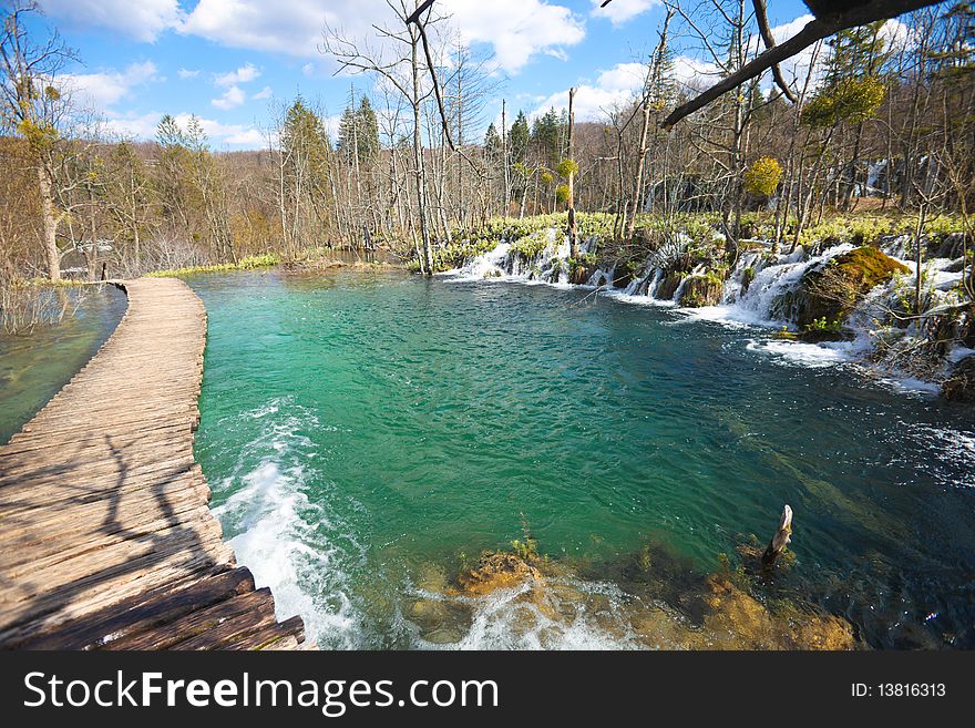 Wooden pathway through the falls at plitvice lakes in croatia. Wooden pathway through the falls at plitvice lakes in croatia