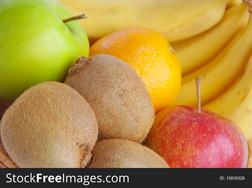 Fruit are in a small basket (background from fruit)