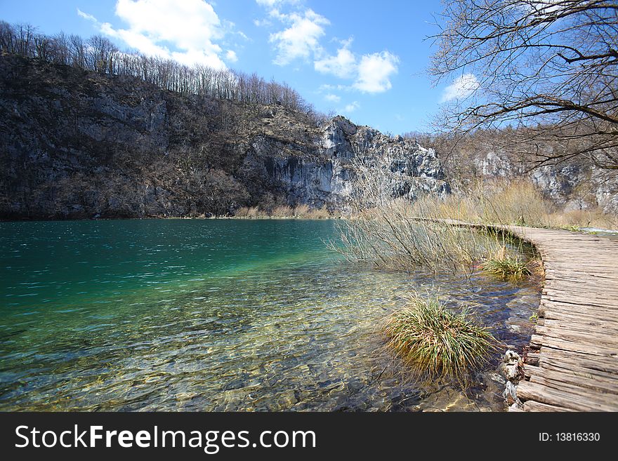 Wooden pathway through the falls at plitvice lakes in croatia. Wooden pathway through the falls at plitvice lakes in croatia