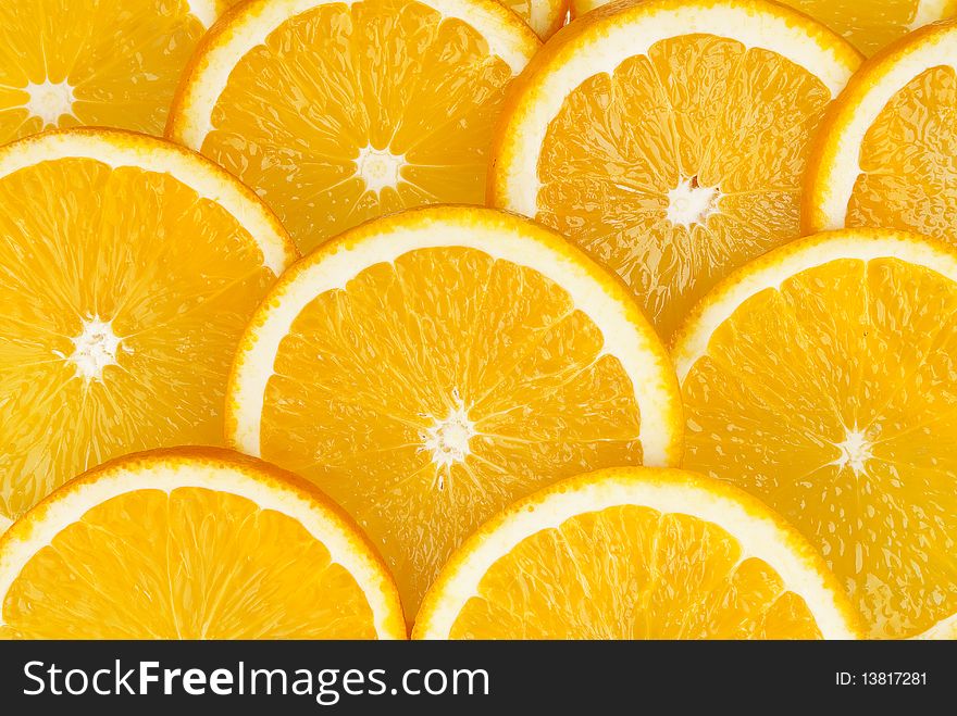 Slices of orange close up. Can use as background. Slices of orange close up. Can use as background