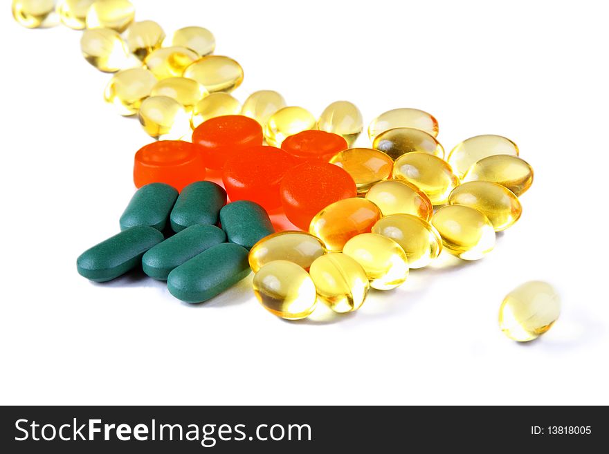 Colourful pills and capsules (red, yellow, green). Colourful pills and capsules (red, yellow, green)