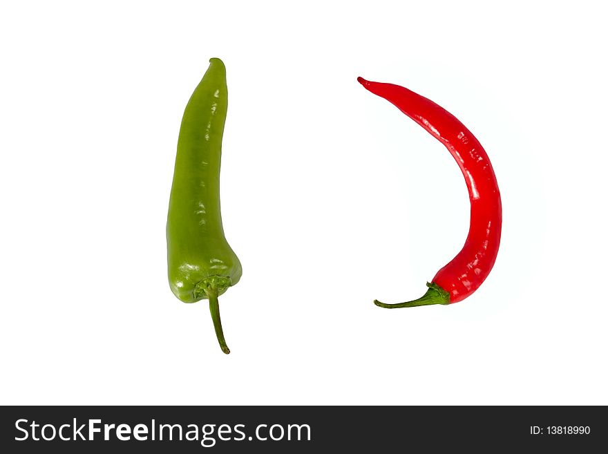 Red and green chili pepper on white background