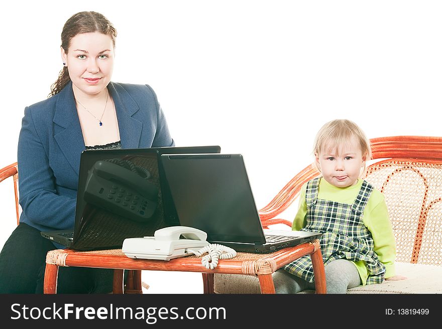 Daughter and mother with laptops