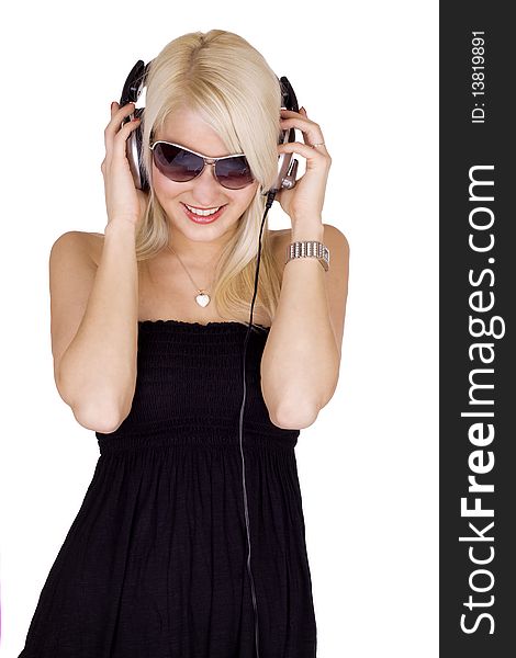 Blond girl with sunglasse listening to music. Blond girl with sunglasse listening to music