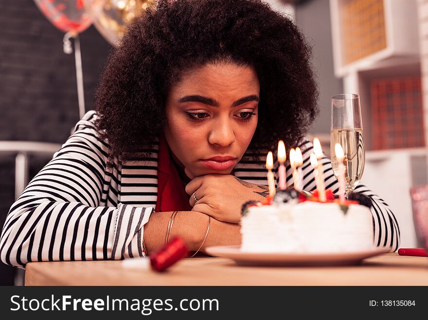 Cheerless young woman thinking about her life
