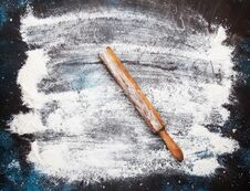 Food Or Baking Background, White Flour Sprinkled On Dark Table, Rustic Wooden Rolling Pin, Top View Stock Images