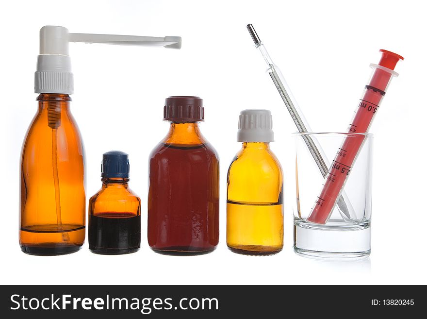 Medical supplies - vial bottles and pills on white background. Medical supplies - vial bottles and pills on white background