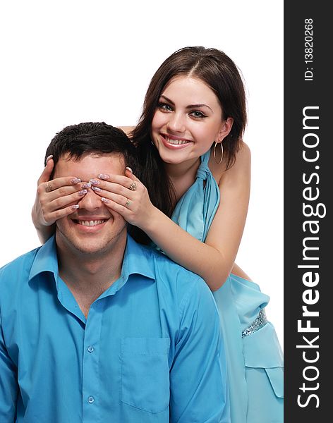 A beautiful young couple posing in studio