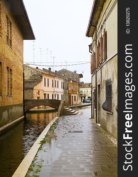 Houses on the river on a rainy day