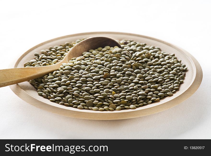 Green lentils on a plate close up shoot