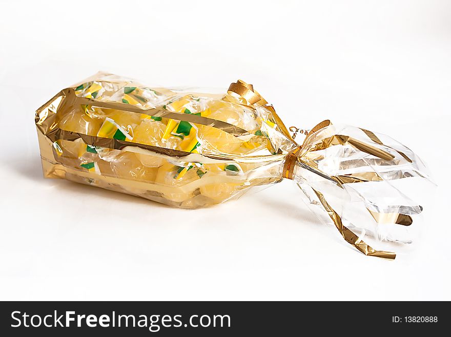Yellow candy bag on white background