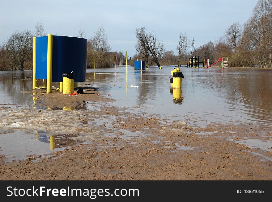 Flood surrounds playground at spring