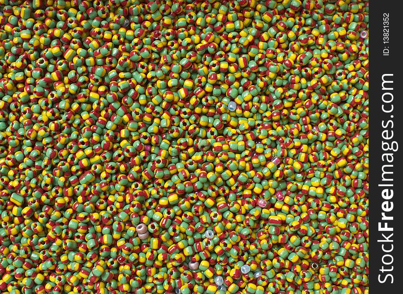 Colorful fake beads, multicolored background