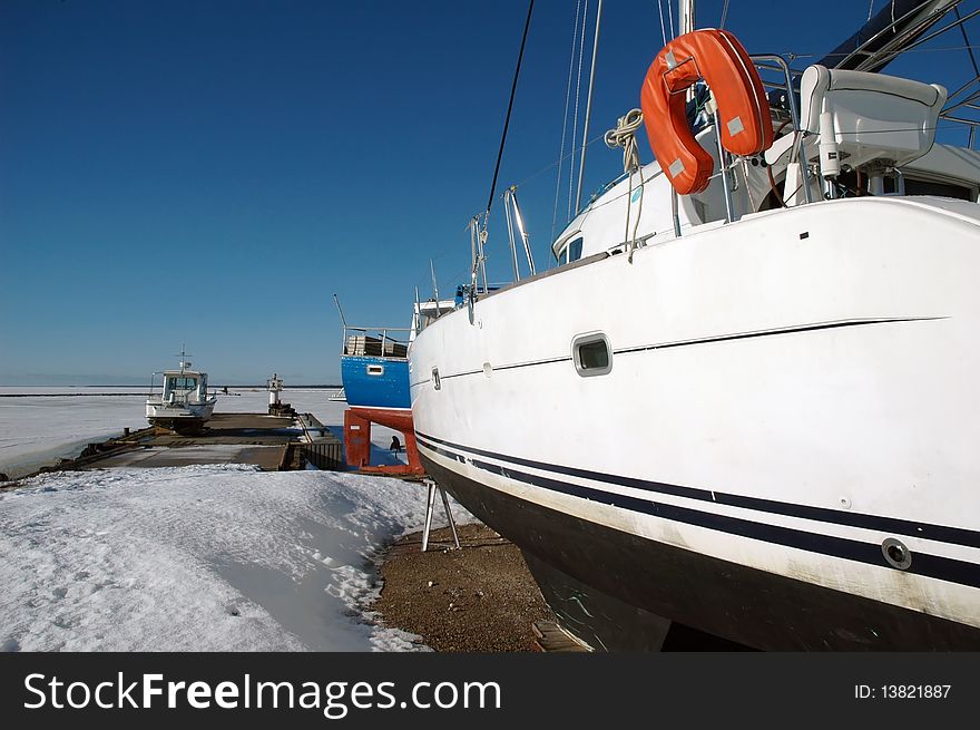 Small frozen harbor in Orjaku, Kassari, Hiiumaa, Estonia at winter