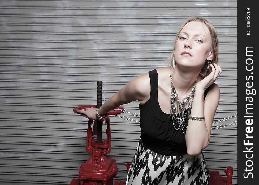 Beautiful young blond posing in an urban setting. Beautiful young blond posing in an urban setting