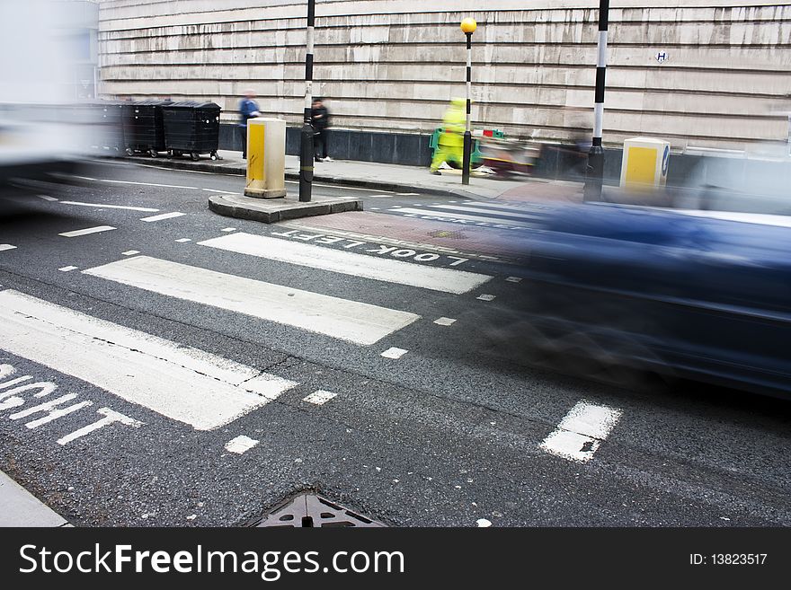 Zebra crossing or pedestrian crossing in london with motion blur of traffic