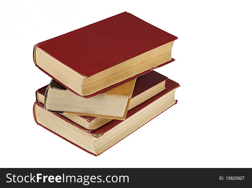 Pile of old worn books isolated on white background. Pile of old worn books isolated on white background