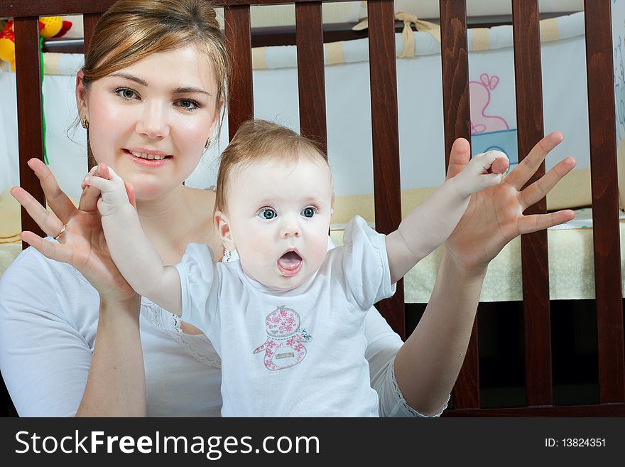 Young beautiful mother with litlle cute baby daughter. Young beautiful mother with litlle cute baby daughter