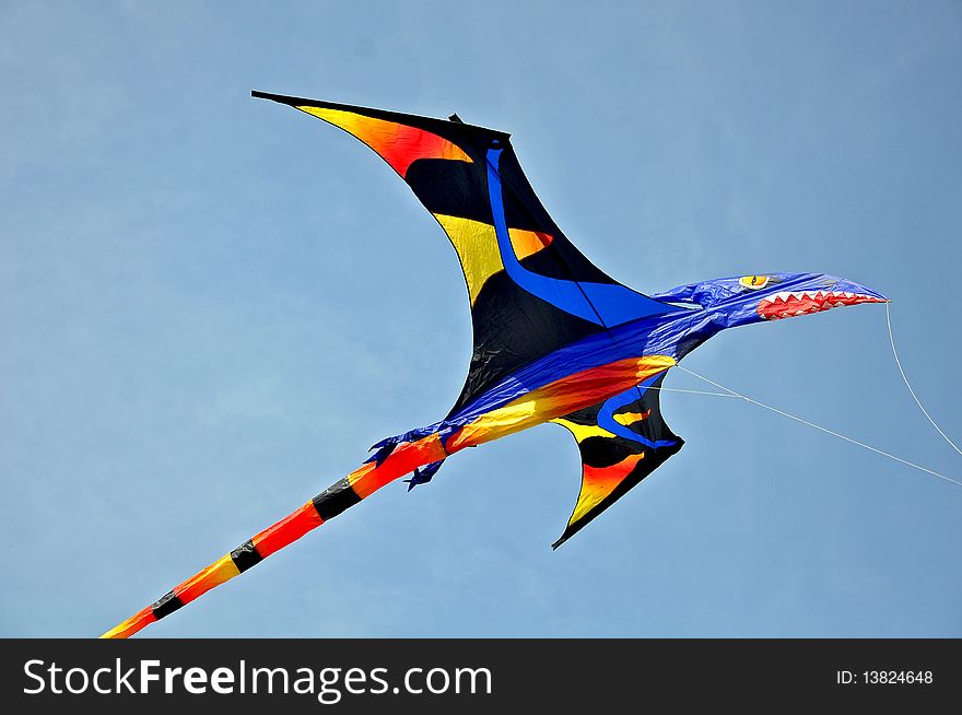Colorful dragon kite in the blue sky