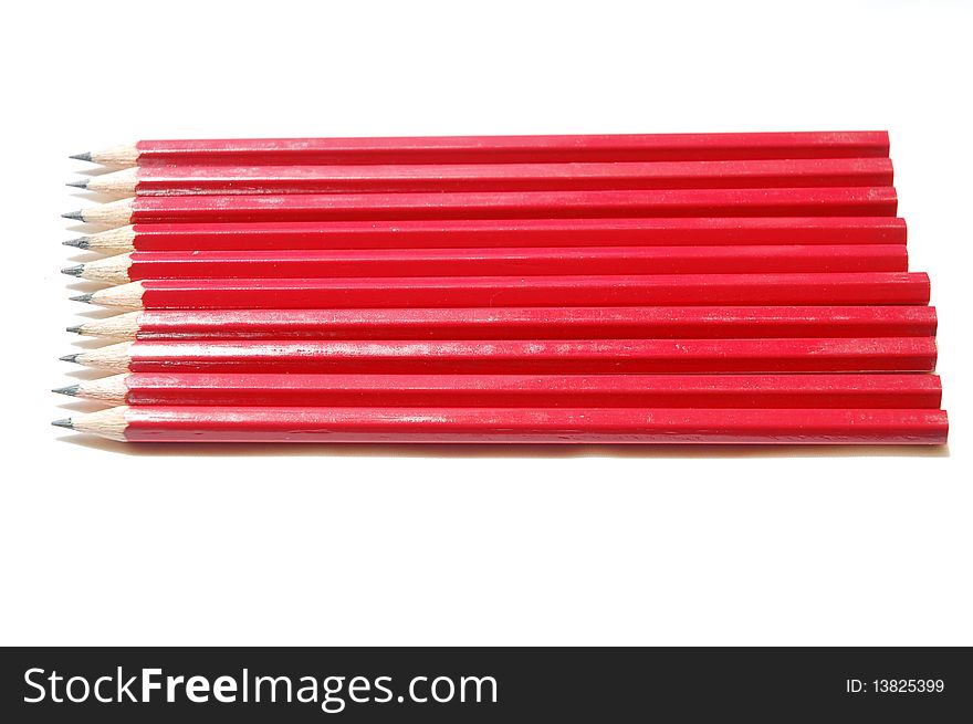 Close up of red pencil with white background