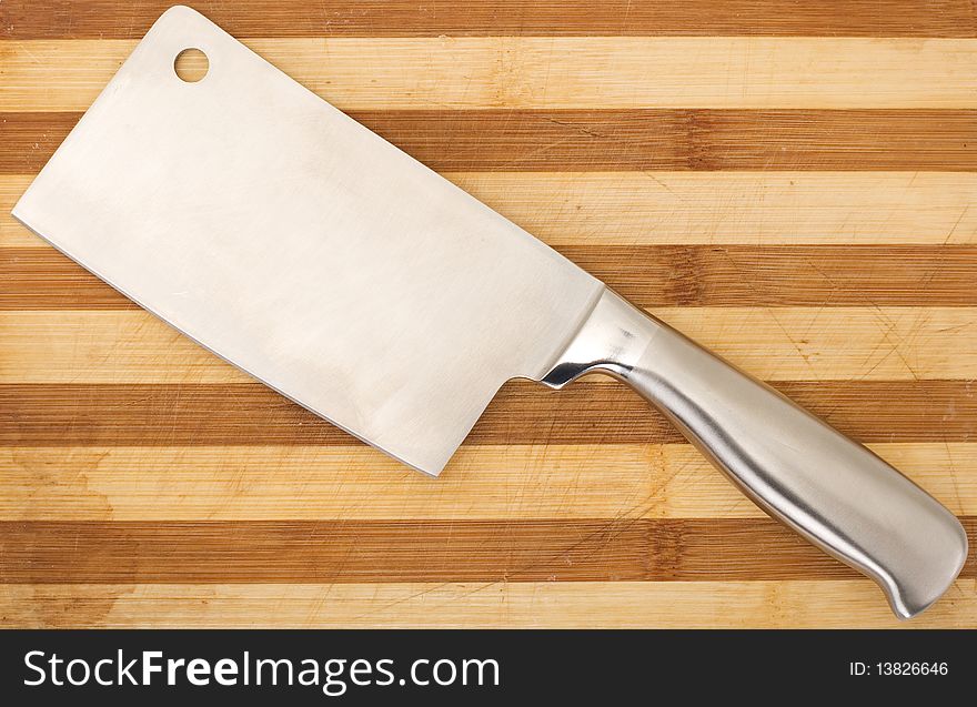 Meat Cleaver Isolated Over Wooden Background