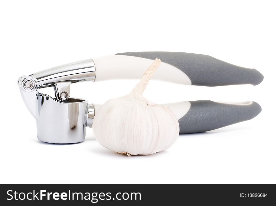 Garlic press isolated on white