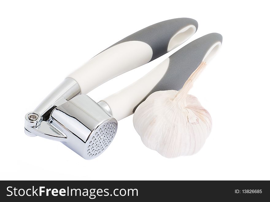 Garlic press isolated on white