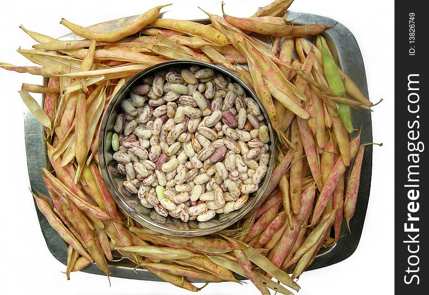 Close up of spotted white kidney beans with the pea pods. Close up of spotted white kidney beans with the pea pods.