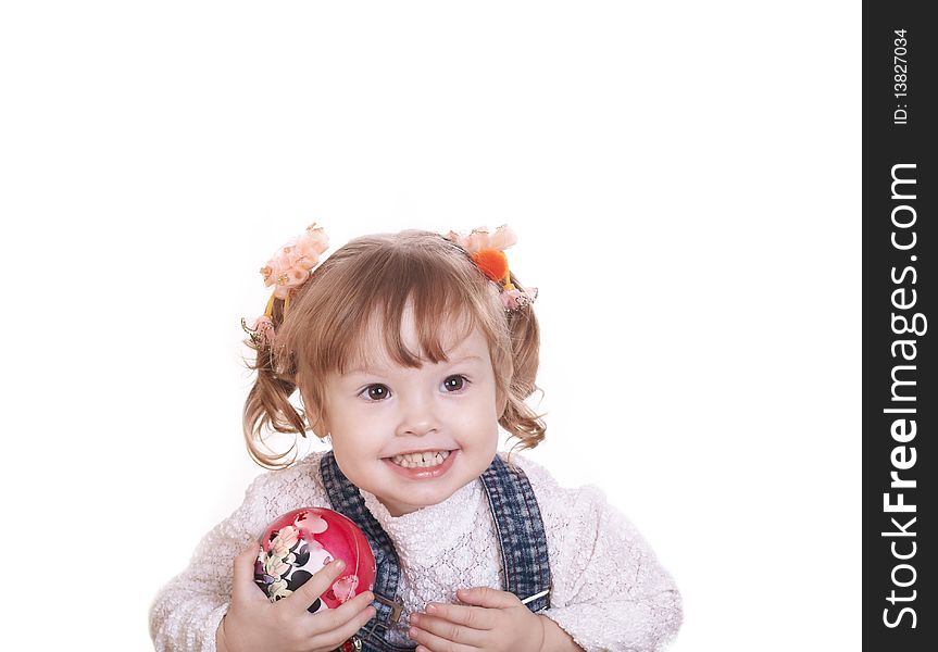 Portrait of the girl with a ball in hands on a white background. Portrait of the girl with a ball in hands on a white background