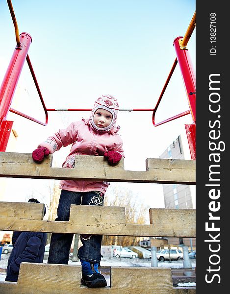 Little Girl Walking On The Playground