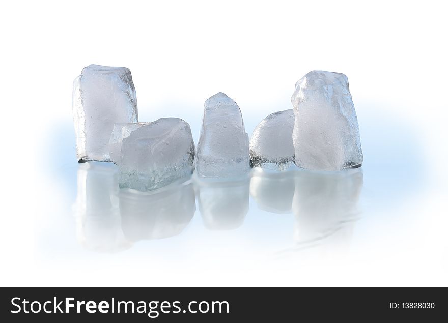 Few ice cubes with reverberation. Isolated on white with clipping path
