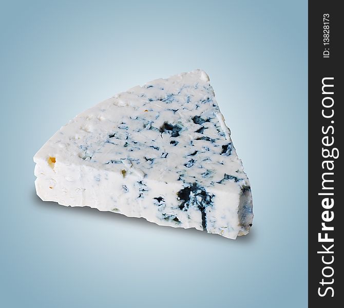 Danish blue cheese on a blue background