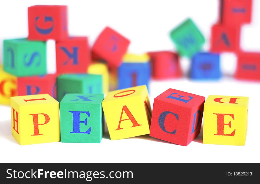 Children's building blocks spelling the word peace