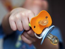 Baby Pacifier And Baby Sleeping, A Little Boy Royalty Free Stock Image